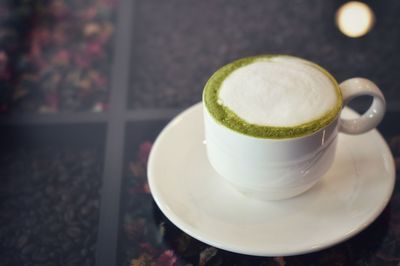 Close-up of coffee cup on table