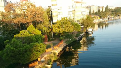 High angle view of canal along buildings