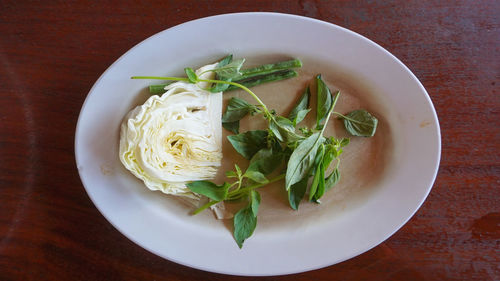 High angle view of salad in bowl on table