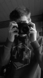 Close-up of woman photographing