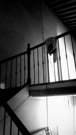 Low angle view of man standing on staircase