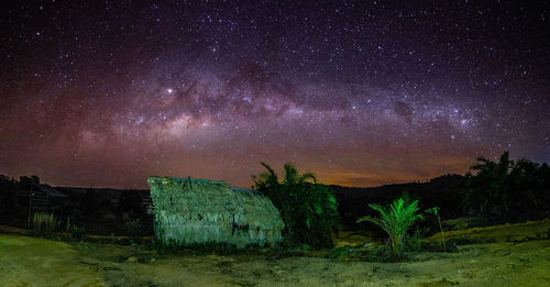 Scenic view of star field against sky at night