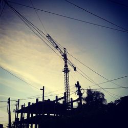 Low angle view of electricity pylon