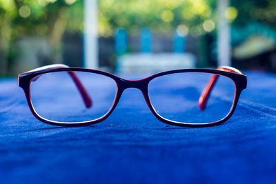 Close-up of sunglasses against blurred background