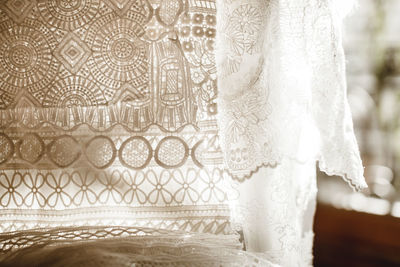 Close-up of white curtain against window