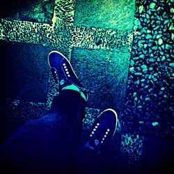 Low section of person standing on ground