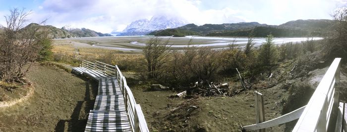 High angle view of dam by river against sky