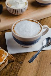 Coffee cup on table