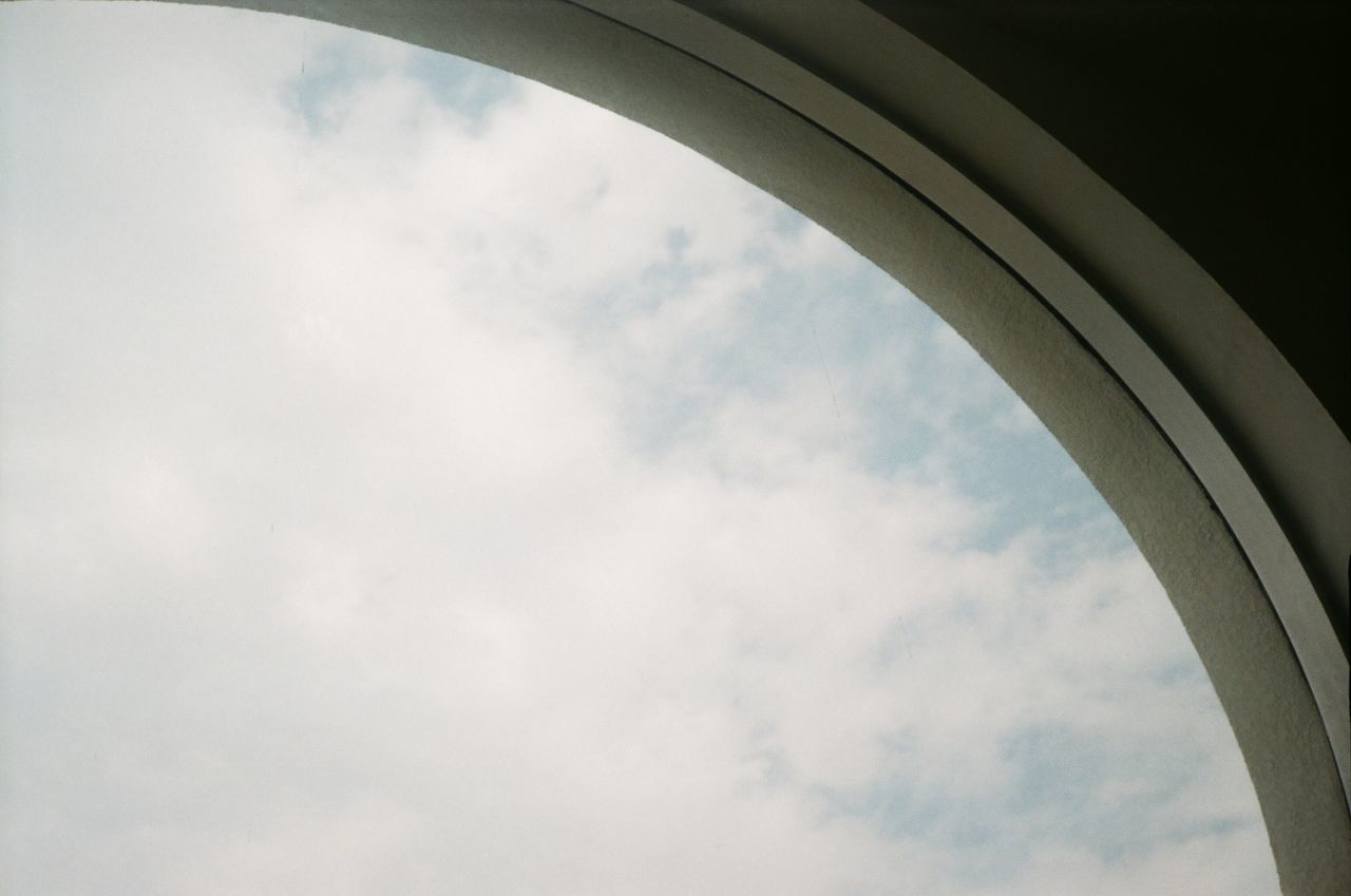 LOW ANGLE VIEW OF SKY SEEN FROM WINDOW