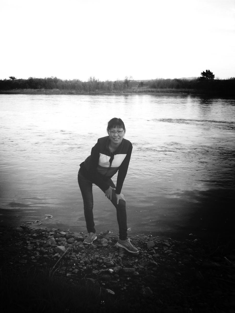 water, lifestyles, full length, leisure activity, clear sky, standing, lake, togetherness, reflection, boys, childhood, casual clothing, love, bonding, nature, tranquility, copy space