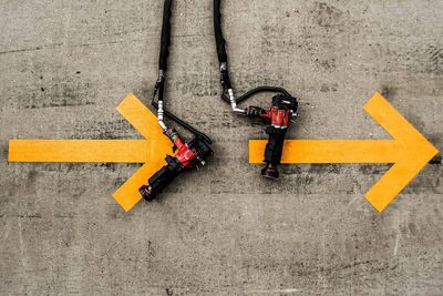 Close-up of yellow arrow symbol