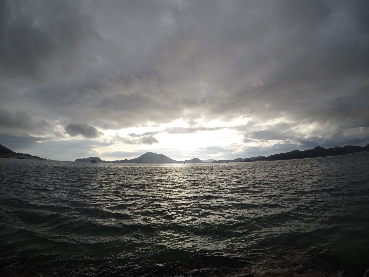 PANORAMIC VIEW OF SEA AGAINST SKY DURING SUNSET