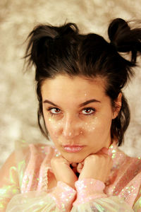 Close-up of young woman looking away