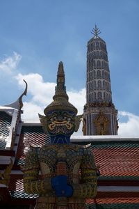 Low angle view of statue of building against sky