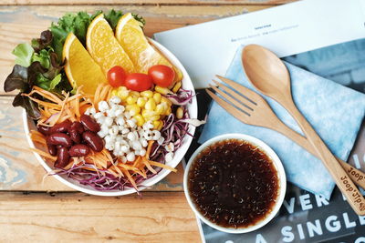 High angle view of fruits in plate on table