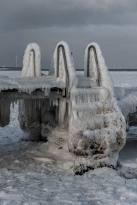 View of frozen sea against sky