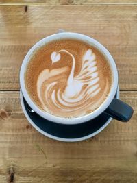 High angle view of cappuccino on table