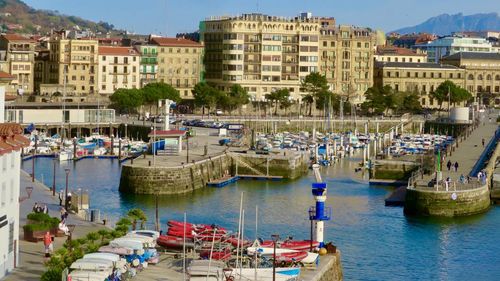 Boats moored at harbor