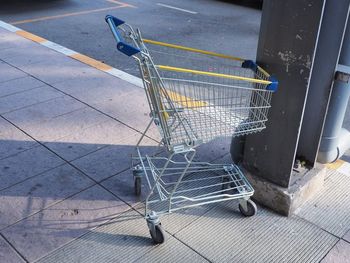 High angle view of shopping cart on street