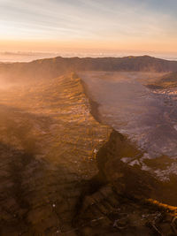 High angle view of land during sunset