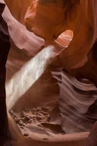 Sunbeam through rock formation at antelope canyon