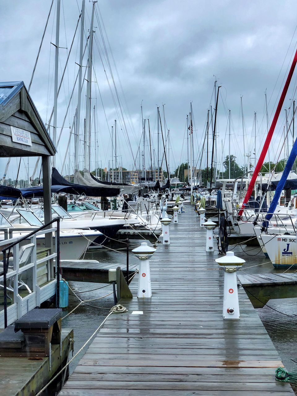 nautical vessel, transportation, water, mode of transportation, sailboat, moored, cloud - sky, sky, pole, sea, harbor, mast, day, no people, nature, outdoors, pier, in a row, yacht, marina