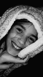 Close-up portrait of a smiling young woman