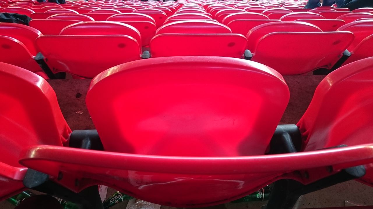 CLOSE-UP OF EMPTY SEATS IN AIRPORT