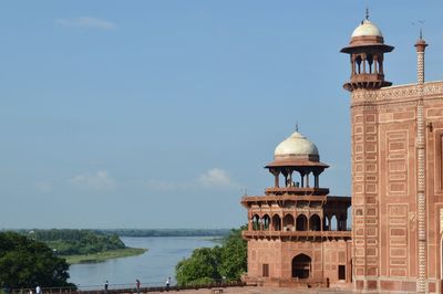 Riverside view of historic building 