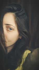 Close-up portrait of young woman