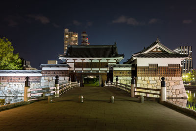 Buildings in city at night