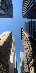 Low angle view of buildings against clear sky