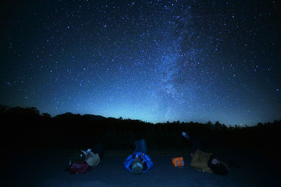 Low angle view of stars in sky at night