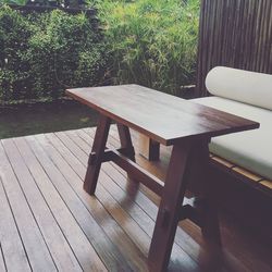 Close-up of table and chairs on hardwood floor