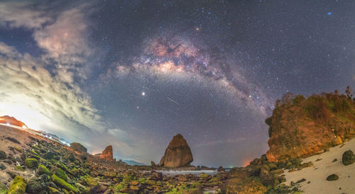 Scenic view of star field against sky at night