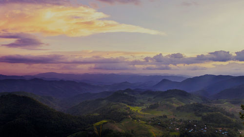 Scenic view of mountains against sky during sunset