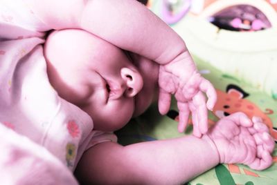 Low section of baby feet