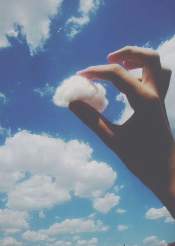 person, sky, part of, cropped, cloud - sky, leisure activity, lifestyles, holding, blue, cloud, human finger, day, personal perspective, sunlight, nature, outdoors, low angle view