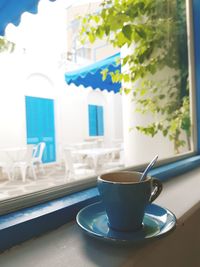 Close-up of coffee cup on table