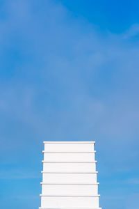 Low angle view of building against blue sky