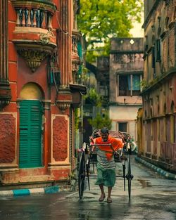 People walking on street in city