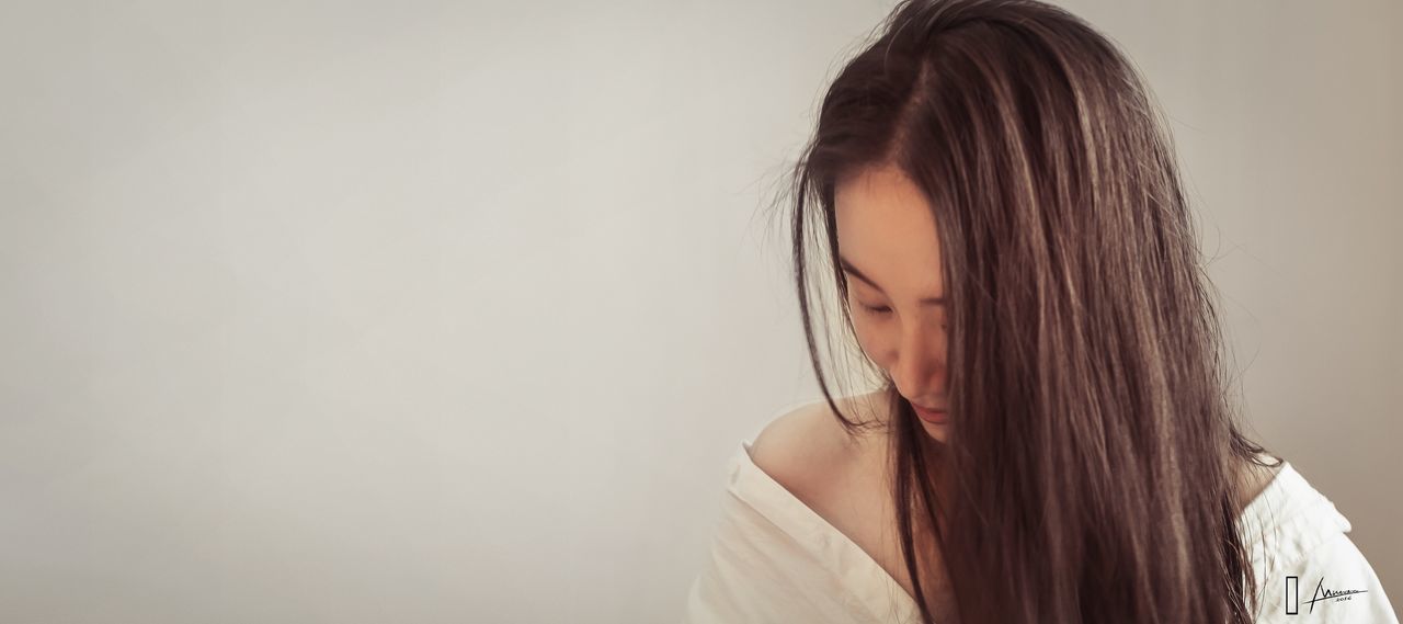 WOMAN LOOKING AT CAMERA