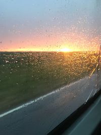 Close-up of wet sky during sunset