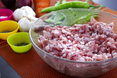 High angle view of chopped vegetables in bowl on table