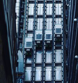 Low angle view of illuminated buildings in city