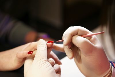 Close-up of people holding hands