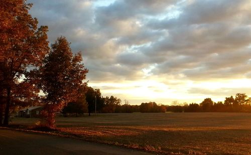 Scenic view of landscape against cloudy sky