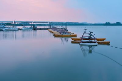 View of fishing boats in lake