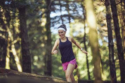 Full length of woman in forest