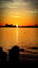 Scenic view of sunset over river